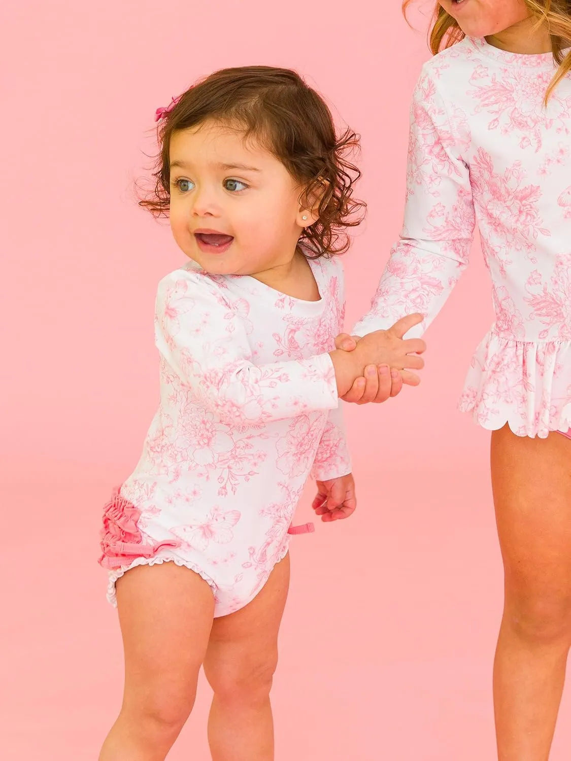 RuffleButts Baby Girls UPF 50  Sun Protection Floral Printed Long Sleeve One Piece Rash Guard Swimsuit with Zipper